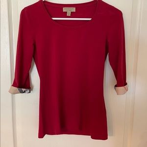 Red Burberry tee with accent